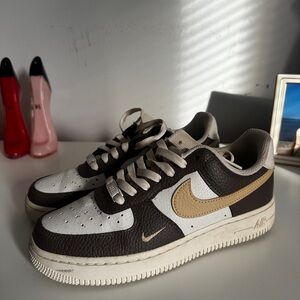 Nike women’s Brown and White Sneakers